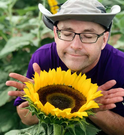 Farmer Hugh in the Sunflower Field